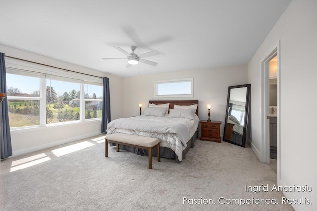 6830 Golden Vw SE, Grand Rapids, MI 49512 - carpeted bedroom with baseboards and a ceiling fan