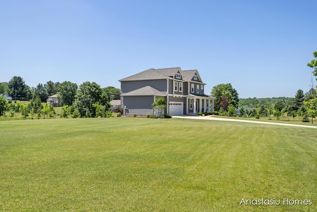 6830 Golden Vw SE, Grand Rapids, MI 49512 - view of front of property with a front lawn and a garage