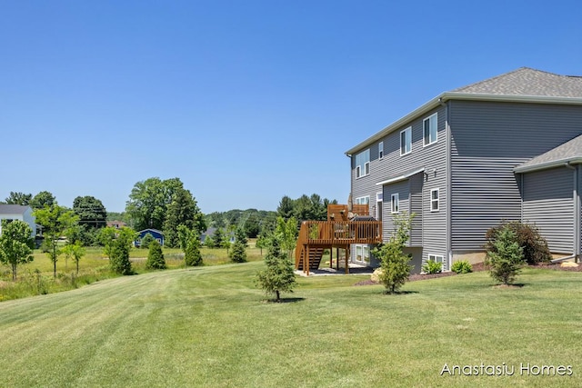 6830 Golden Vw SE, Grand Rapids, MI 49512 - view of grassy yard featuring a wooden deck and stairway