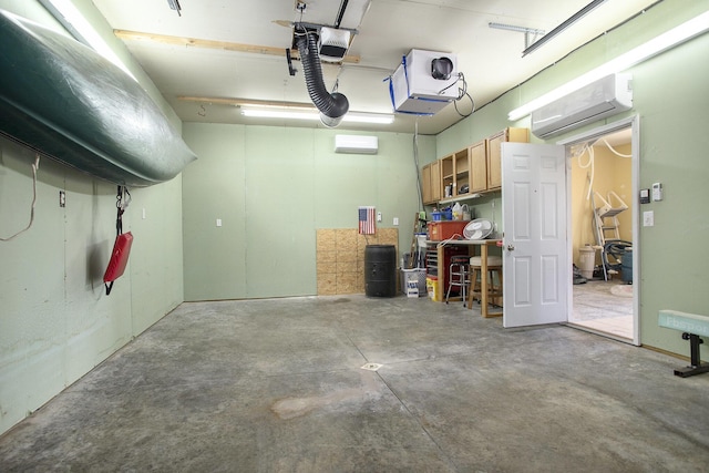 11494 18 1/2 Mile Rd, Marshall, MI 49068 - garage featuring a wall unit AC, a garage door opener, and a heating unit