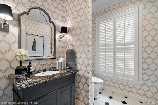364 Chesterfield Ave, Birmingham, MI 48009 - bathroom with vanity, ornamental molding, toilet, plenty of natural light, and baseboards
