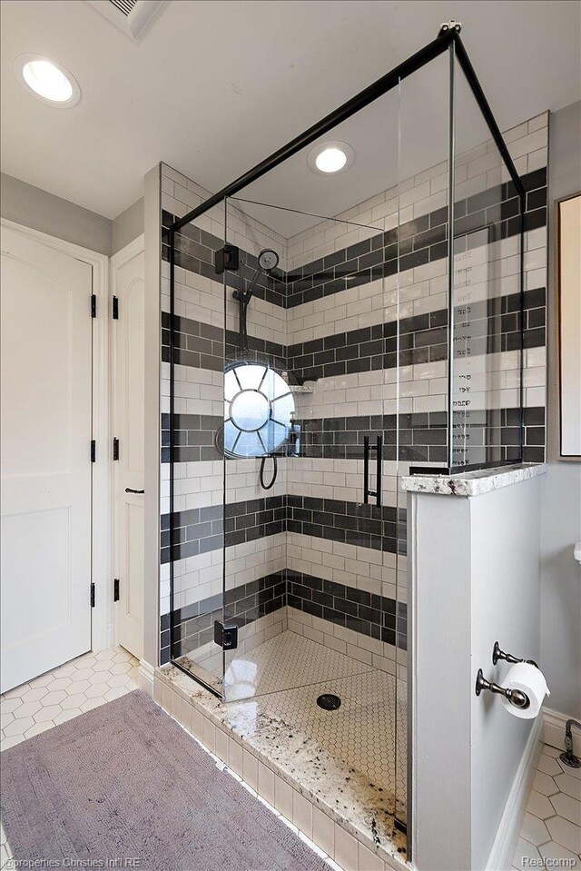 364 Chesterfield Ave, Birmingham, MI 48009 - bathroom featuring a stall shower, recessed lighting, and tile patterned flooring