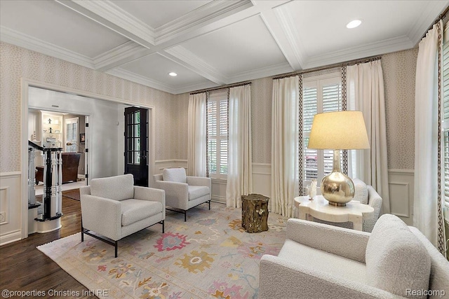 364 Chesterfield Ave, Birmingham, MI 48009 - living area with coffered ceiling, beamed ceiling, ornamental molding, a decorative wall, and wood finished floors