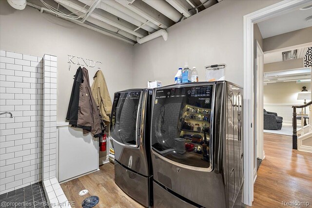 364 Chesterfield Ave, Birmingham, MI 48009 - washroom featuring washing machine and dryer and wood finished floors