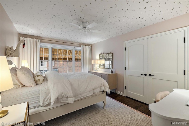 364 Chesterfield Ave, Birmingham, MI 48009 - bedroom featuring dark wood-style floors, a ceiling fan, and a closet
