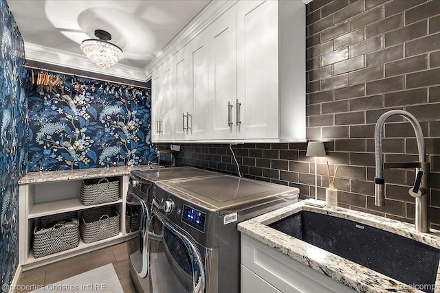 364 Chesterfield Ave, Birmingham, MI 48009 - washroom with cabinet space, independent washer and dryer, wallpapered walls, and ornamental molding