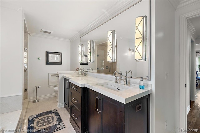 364 Chesterfield Ave, Birmingham, MI 48009 - bathroom featuring double vanity, toilet, ornamental molding, baseboards, and a shower