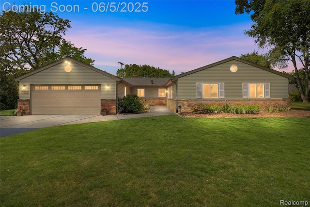 5908 Burnham Rd, Bloomfield Hills, MI 48302 - ranch-style home with brick siding, driveway, a front yard, and an attached garage