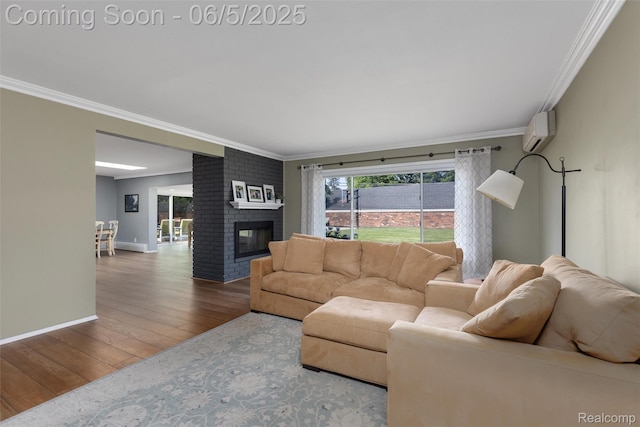 5908 Burnham Rd, Bloomfield Hills, MI 48302 - living room featuring crown molding, wood finished floors, an AC wall unit, a fireplace, and baseboards