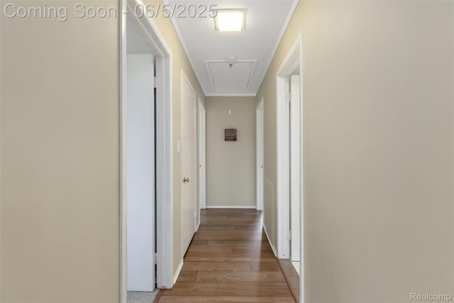 5908 Burnham Rd, Bloomfield Hills, MI 48302 - hallway with attic access, wood finished floors, and baseboards