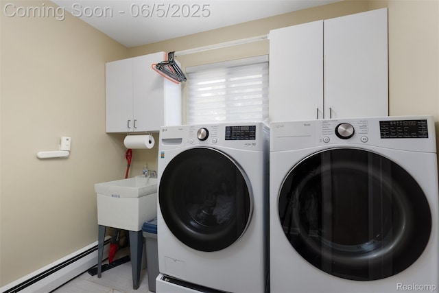 5908 Burnham Rd, Bloomfield Hills, MI 48302 - laundry area featuring cabinet space, a baseboard heating unit, and washing machine and clothes dryer