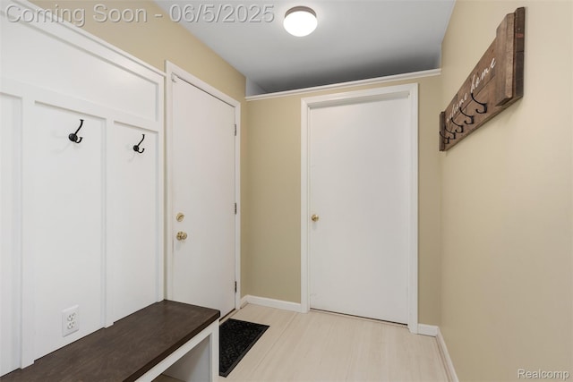 5908 Burnham Rd, Bloomfield Hills, MI 48302 - mudroom featuring baseboards
