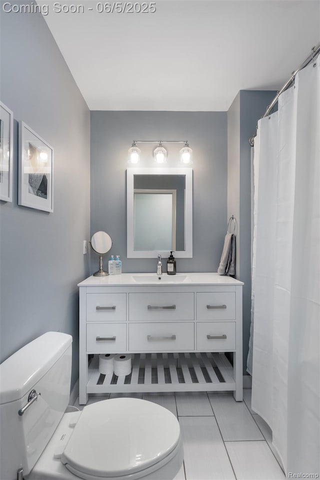 5908 Burnham Rd, Bloomfield Hills, MI 48302 - bathroom with toilet, vanity, and a shower with shower curtain