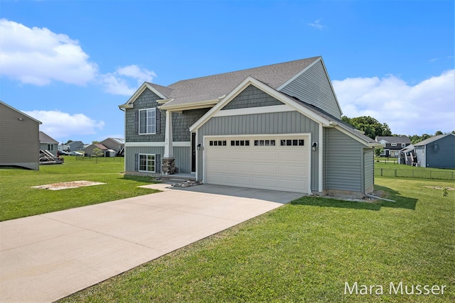 310 Robin Ct, Caledonia, MI 49316 - view of front of house with concrete driveway, an attached garage, and board and batten siding