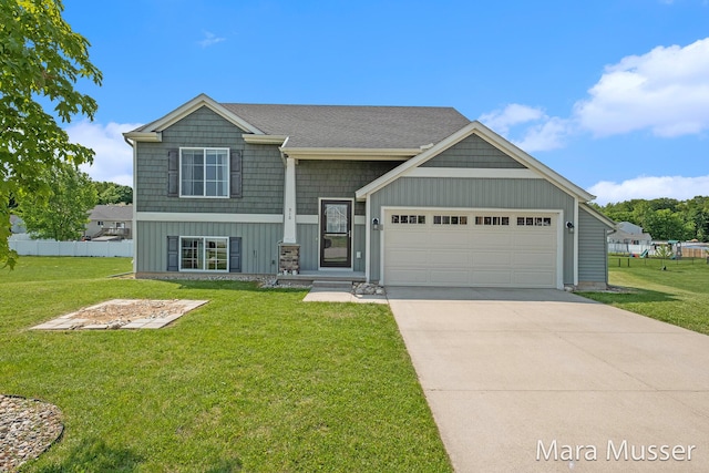 310 Robin Ct, Caledonia, MI 49316 - view of front of house with a garage and driveway