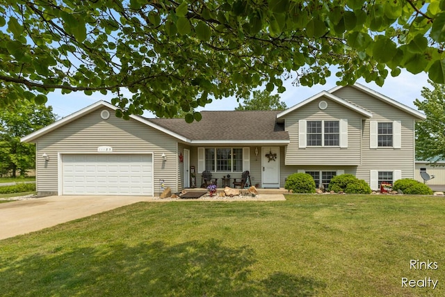 11185 Stanton St, West Olive, MI 49460 - split level home featuring a garage, a front yard, driveway, and a porch