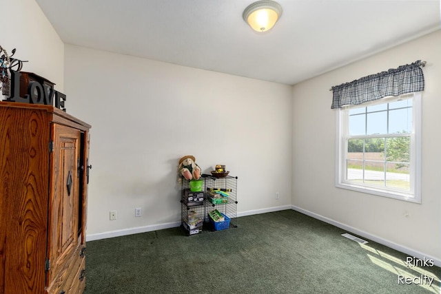 11185 Stanton St, West Olive, MI 49460 - carpeted empty room with baseboards