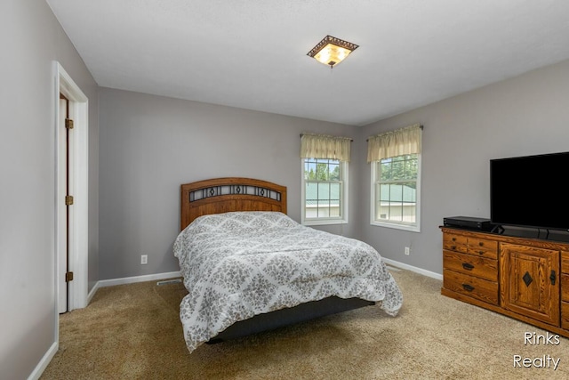 11185 Stanton St, West Olive, MI 49460 - bedroom featuring carpet flooring and baseboards