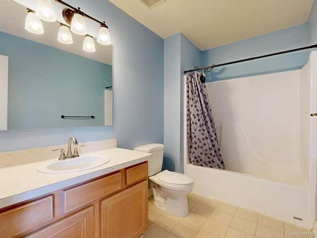 71 Grandview Cir, White Lake, MI 48386 - bathroom featuring vanity, shower / bath combo, toilet, and tile patterned flooring