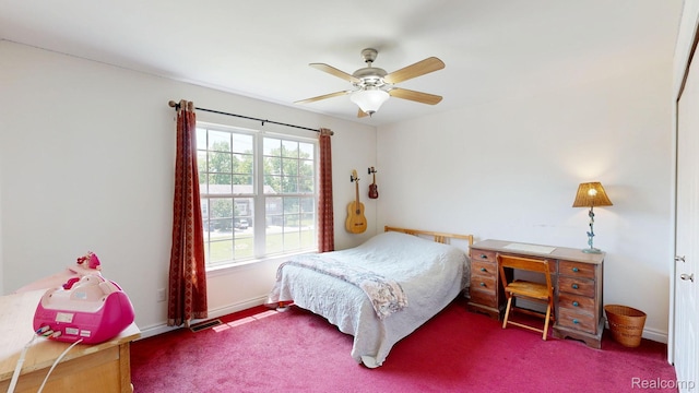 71 Grandview Cir, White Lake, MI 48386 - bedroom with carpet, a ceiling fan, and baseboards