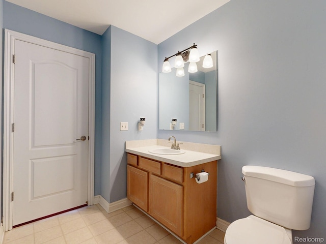 71 Grandview Cir, White Lake, MI 48386 - half bathroom featuring vanity, toilet, and baseboards