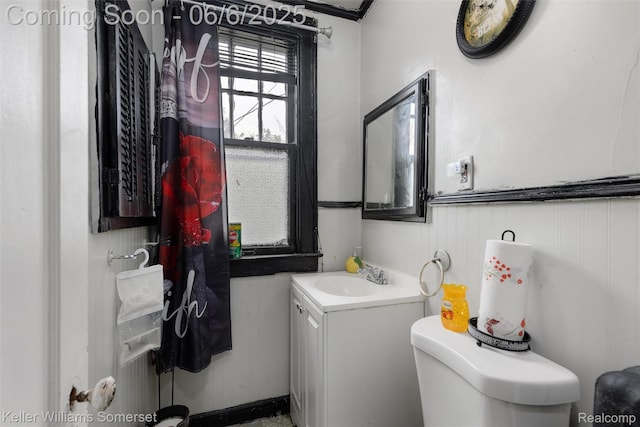 1475 Atkinson St, Detroit, MI 48206 - bathroom featuring toilet and vanity