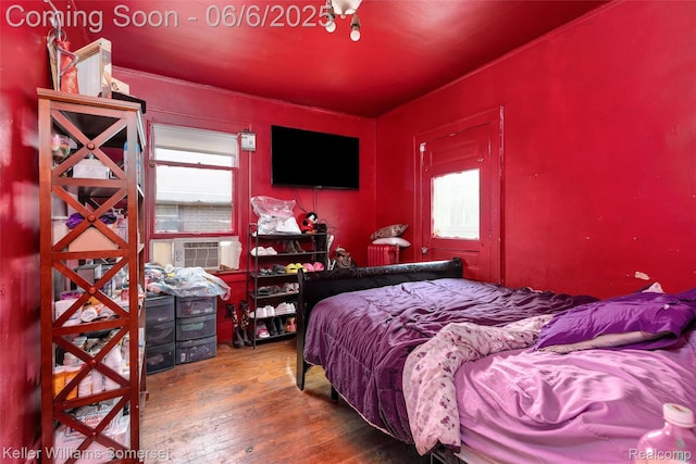 1475 Atkinson St, Detroit, MI 48206 - bedroom with multiple windows, hardwood / wood-style flooring, and cooling unit