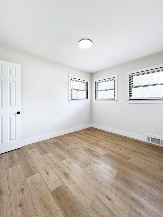 20215 Damman St, Harper Woods, MI 48225 - empty room with light wood finished floors and baseboards