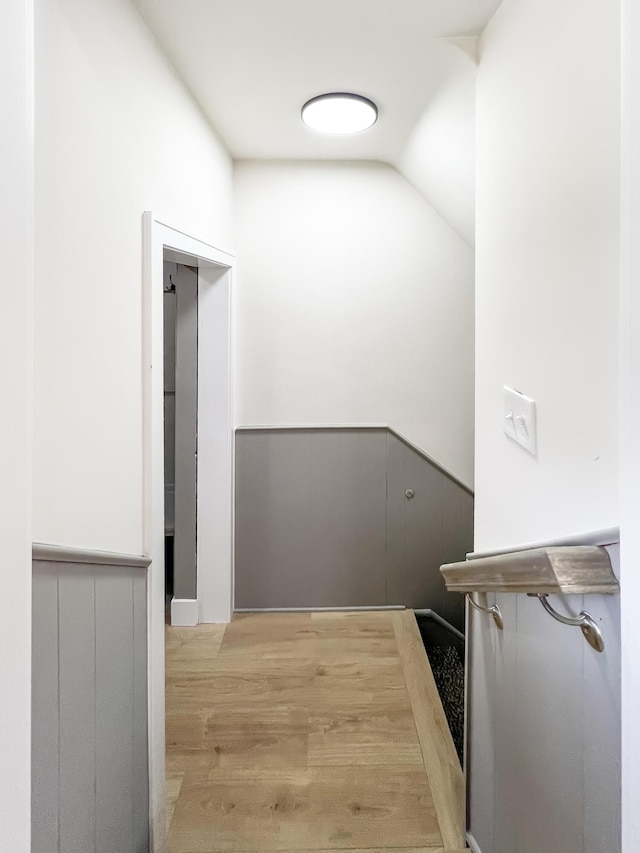 20215 Damman St, Harper Woods, MI 48225 - hallway with light wood-style flooring and vaulted ceiling