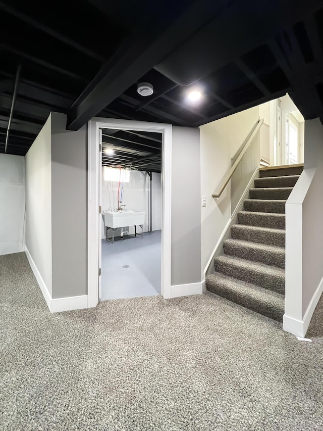 20215 Damman St, Harper Woods, MI 48225 - basement with baseboards, stairs, and carpet flooring