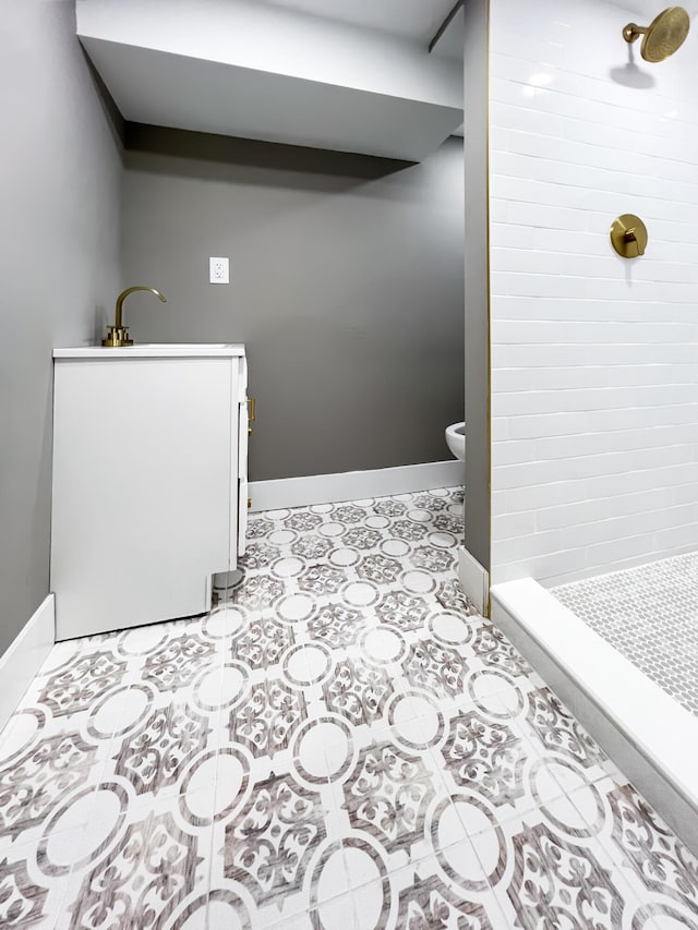 20215 Damman St, Harper Woods, MI 48225 - full bath featuring a shower stall, toilet, baseboards, and a sink