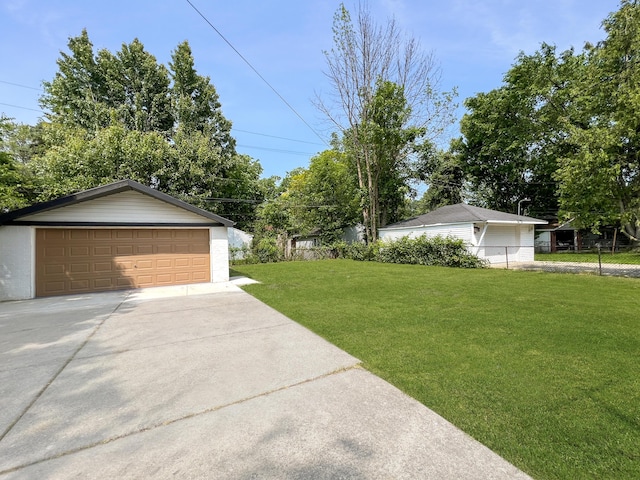 20215 Damman St, Harper Woods, MI 48225 - view of yard featuring a detached garage and an outdoor structure