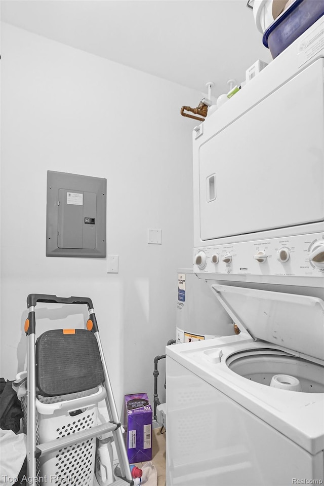 11685 Squiers Blvd, Utica, MI 48315 - washroom with stacked washing machine and dryer and electric panel