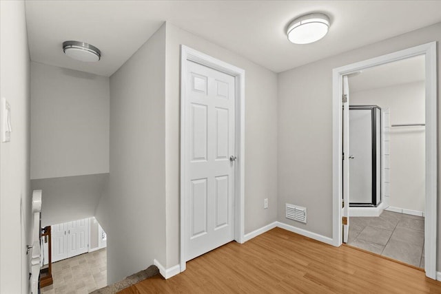 2128 Somerset Rd, Bloomfield Hills, MI 48302 - unfurnished bedroom with wood finished floors and baseboards