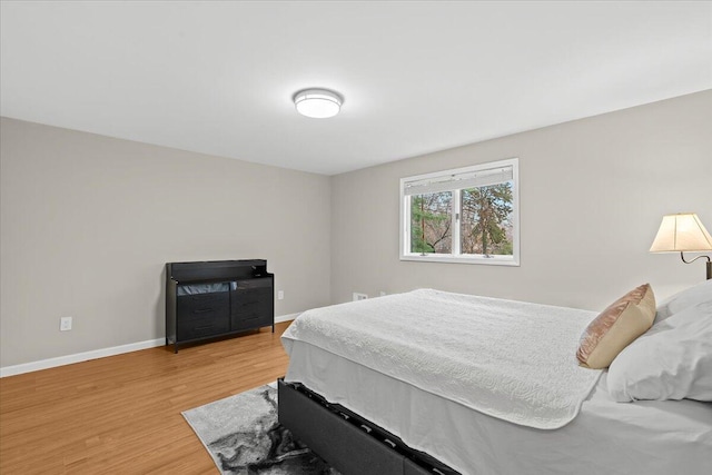 2128 Somerset Rd, Bloomfield Hills, MI 48302 - bedroom with light wood-type flooring and baseboards