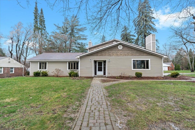 2128 Somerset Rd, Bloomfield Hills, MI 48302 - ranch-style house with a chimney and a front lawn