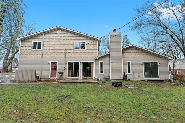 2128 Somerset Rd, Bloomfield Hills, MI 48302 - back of property featuring a lawn and a chimney