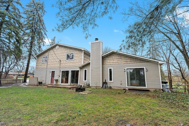2128 Somerset Rd, Bloomfield Hills, MI 48302 - back of house featuring a chimney and an outdoor fire pit