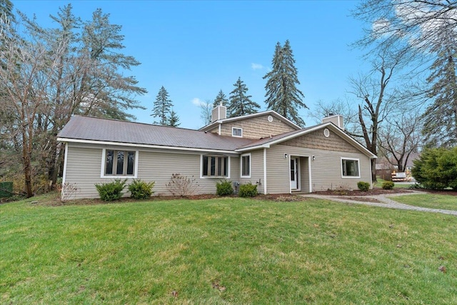2128 Somerset Rd, Bloomfield Hills, MI 48302 - traditional home featuring a chimney and a front lawn