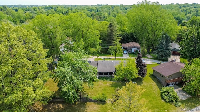 2650 Devonshire, Leonard, MI 48367 - view of subject property featuring a forest