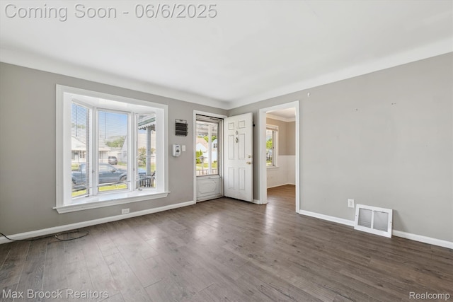 21426 Syracuse Ave, Warren, MI 48091 - empty room with wood finished floors and baseboards