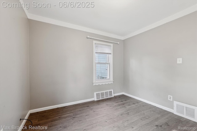 21426 Syracuse Ave, Warren, MI 48091 - spare room featuring wood finished floors and baseboards