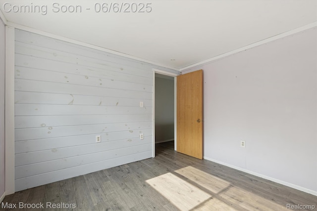 21426 Syracuse Ave, Warren, MI 48091 - spare room with wood finished floors and baseboards