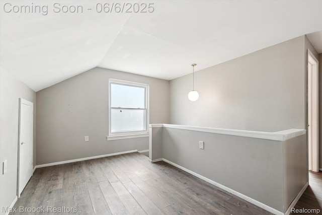 21426 Syracuse Ave, Warren, MI 48091 - bonus room with wood finished floors, lofted ceiling, and baseboards
