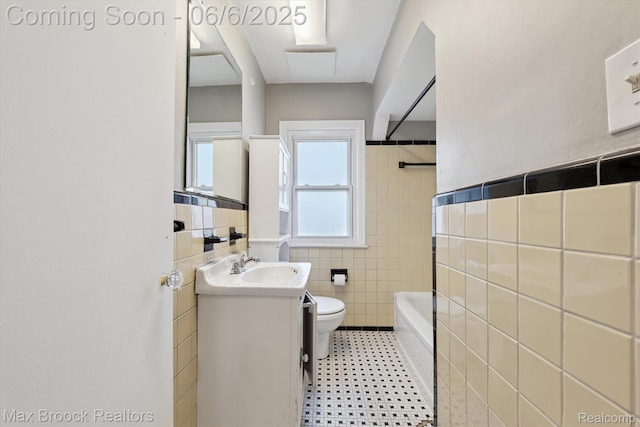 21426 Syracuse Ave, Warren, MI 48091 - full bath featuring tile walls, toilet, vanity, and shower / bath combination