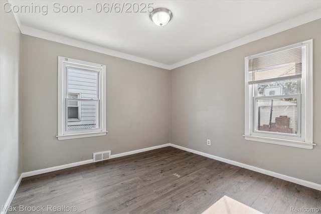 21426 Syracuse Ave, Warren, MI 48091 - unfurnished room with wood finished floors and baseboards