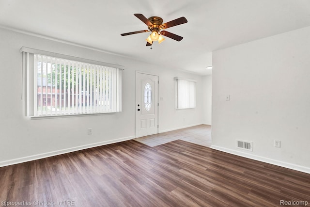 244 E Woodward Heights Blvd, Hazel Park, MI 48030 - entrance foyer featuring plenty of natural light, ceiling fan, wood finished floors, and baseboards