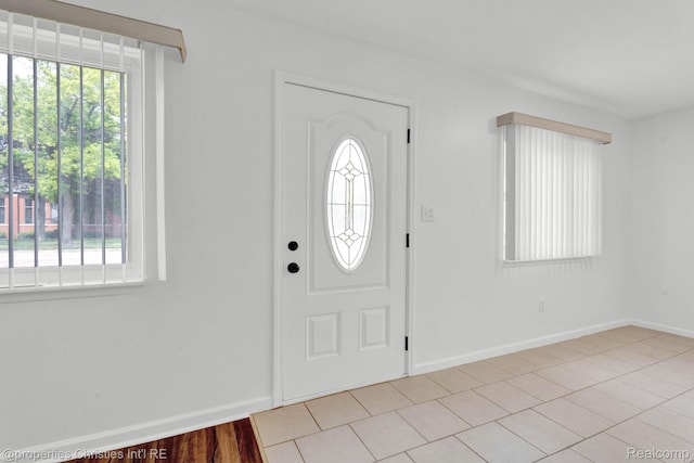 244 E Woodward Heights Blvd, Hazel Park, MI 48030 - entryway with light tile patterned floors and baseboards