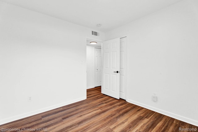 244 E Woodward Heights Blvd, Hazel Park, MI 48030 - unfurnished bedroom featuring baseboards and wood finished floors