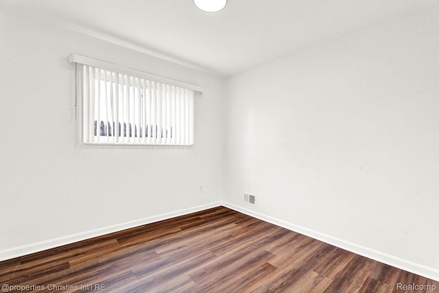 244 E Woodward Heights Blvd, Hazel Park, MI 48030 - unfurnished room featuring dark wood-type flooring and baseboards